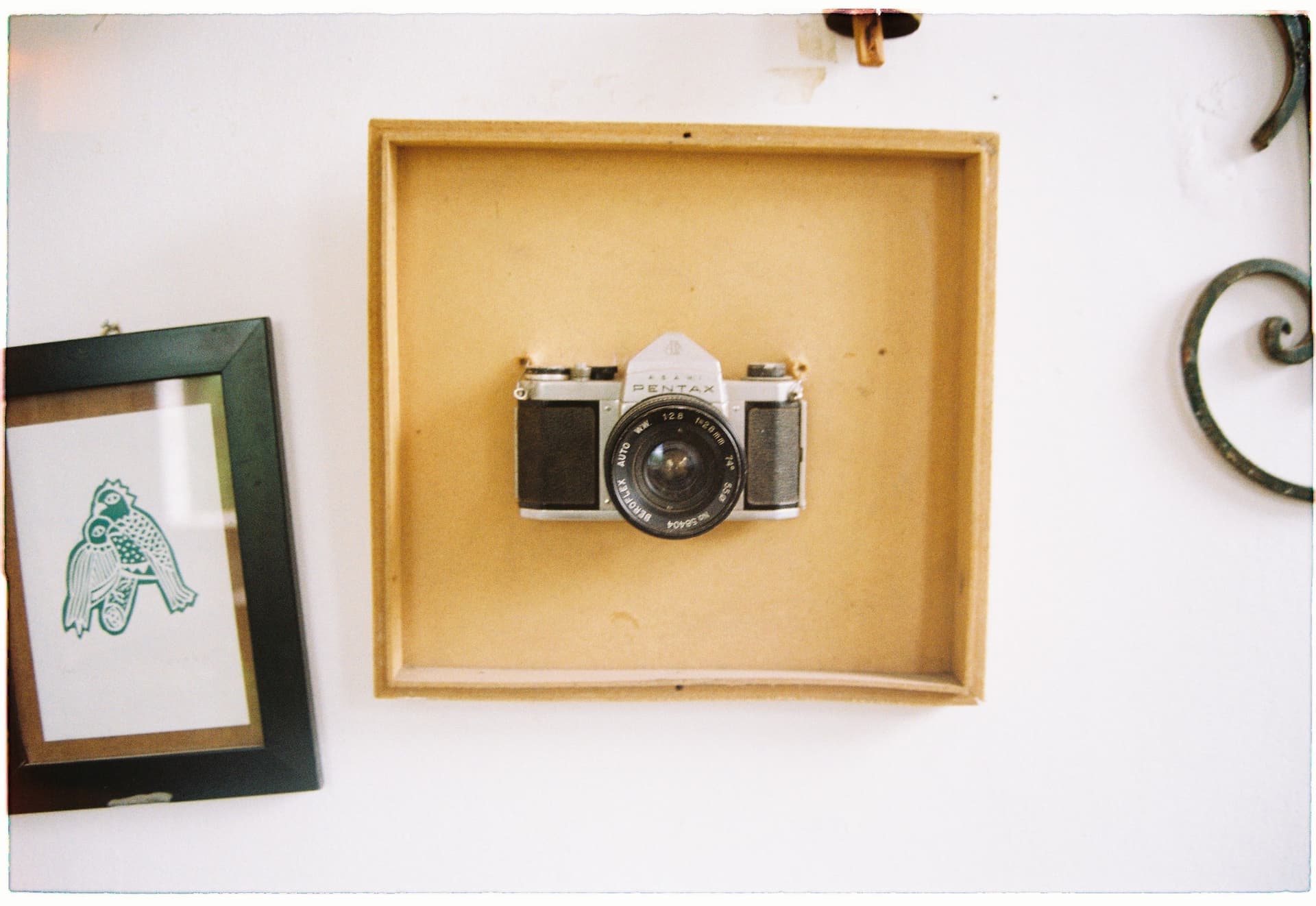 A deep display box frame mounted on a wall